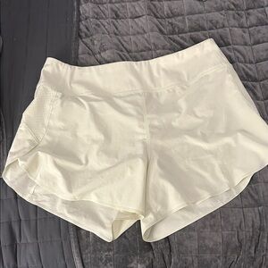 Athleta Cream/light yellowAthletic Shorts with Perforated Side Panels